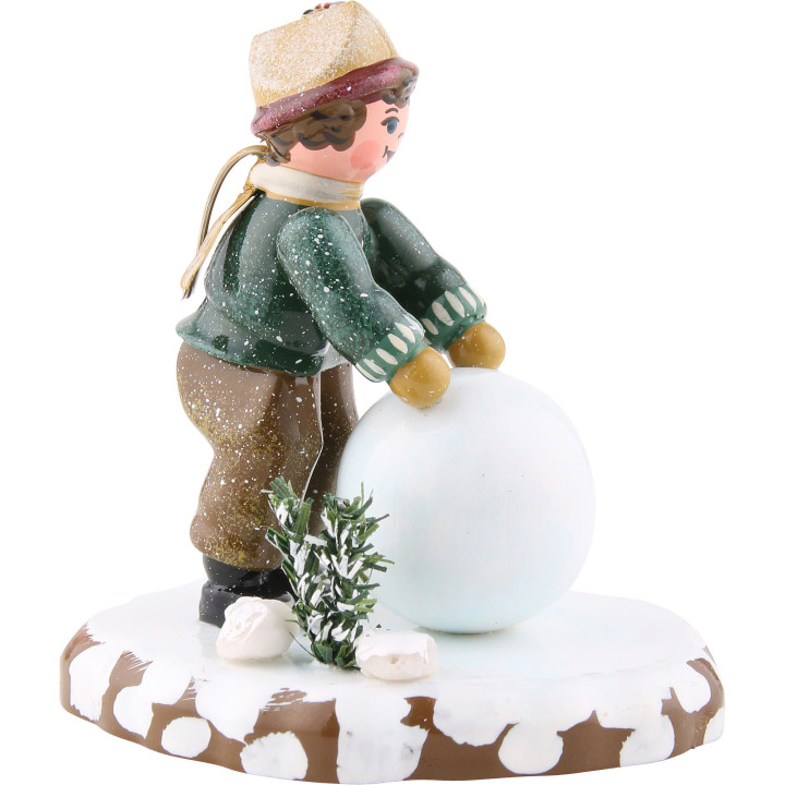 Winterkinder Junge mit Schneekugel