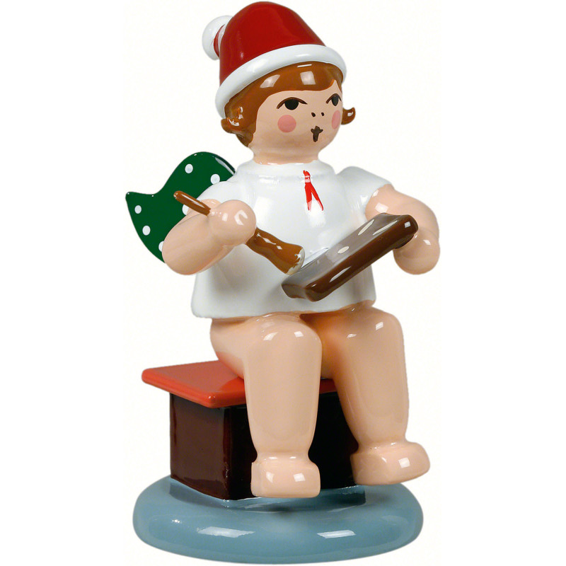 Bäckerengel sitzend mit Mütze und Pfefferkuchen - 6,5 cm