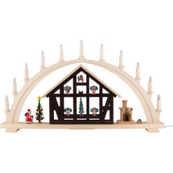 Schwibbogen Weihnachtsmannhaus mit Pfefferküchlerei - 76x42,5 cm