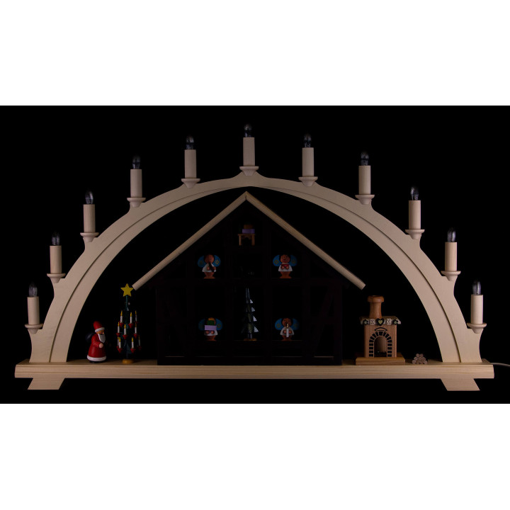 Schwibbogen Weihnachtsmannhaus mit Pfefferküchlerei - 76x42,5 cm