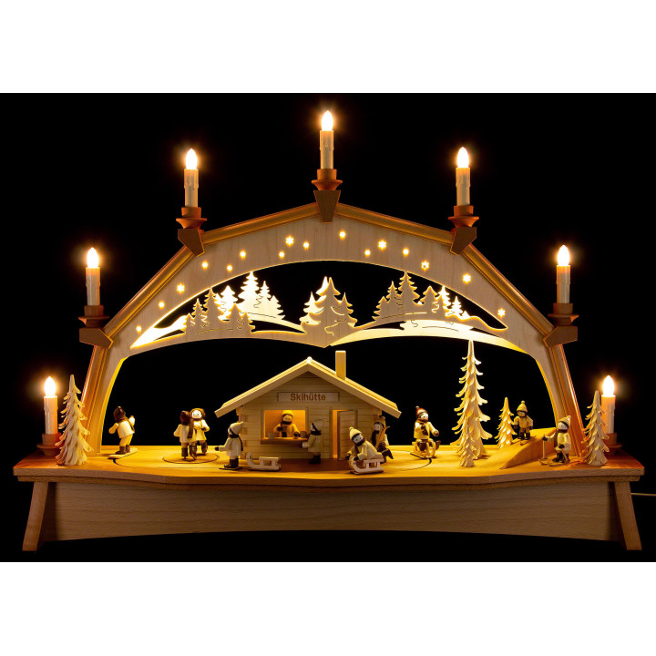 Schwibbogen Skihütte mit beweglichen Winterkindern - 76x52 cm