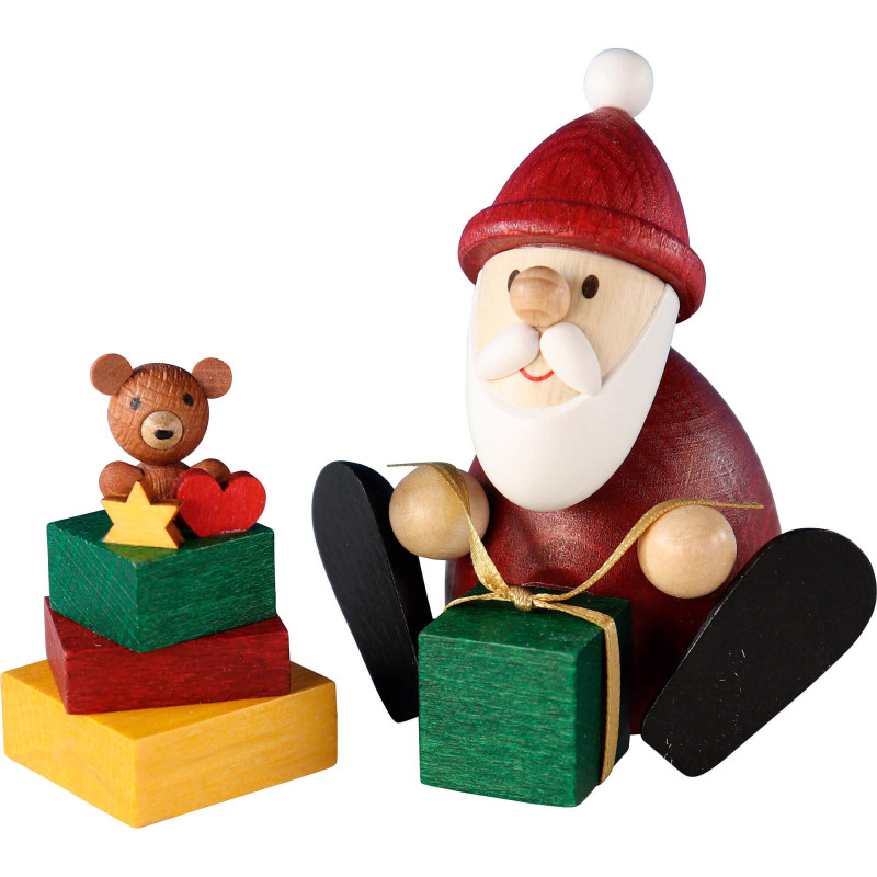 Weihnachtsmann mit Geschenk und Geschenkestapel - 8,3 cm